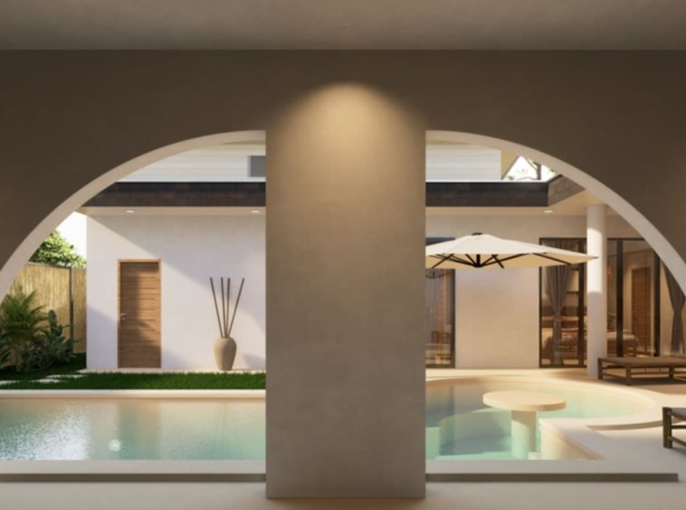 Villa leasehold piscine privée Lamai Koh Samui, vue encadrée par une arche en béton sur la piscine avec transat et parasol blanc
