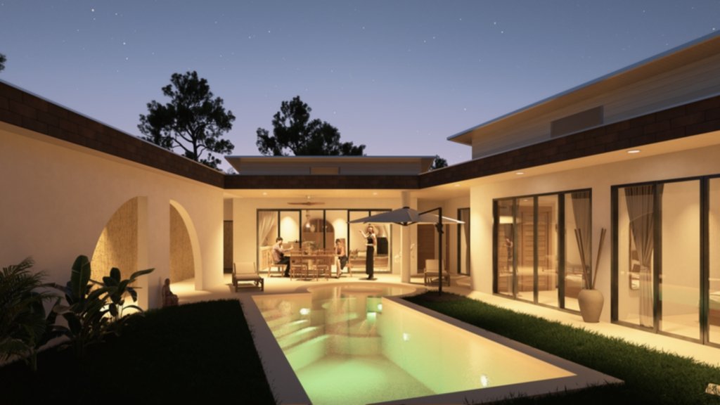 Villa leasehold Lamai centre Koh Samui de nuit, cour intérieure illuminée avec piscine, arche décorative blanche et espace repas couvert