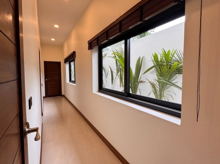Couloir desservant les chambres de la Villa Chana 3 chambres